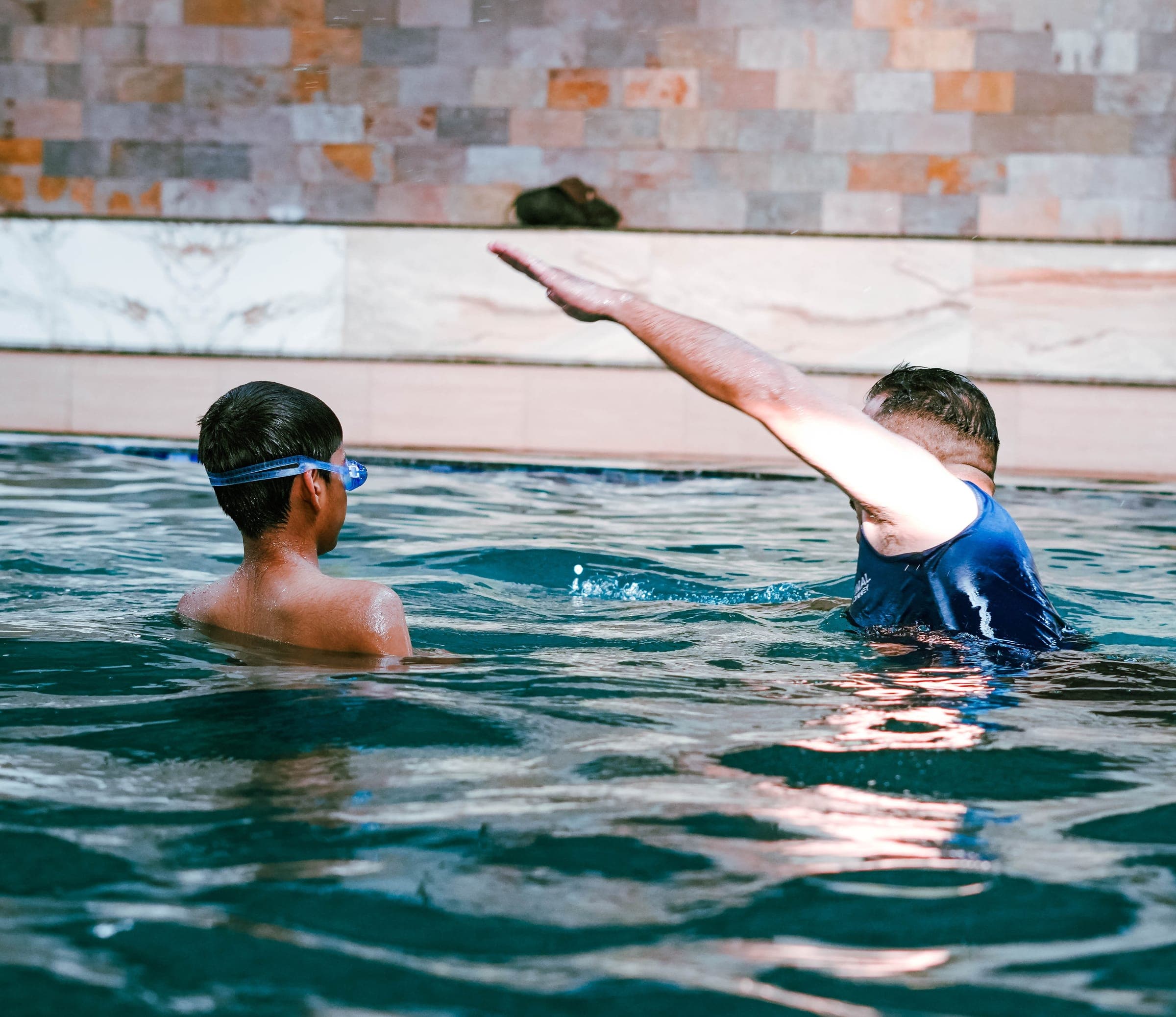 One-on-one swimming lesson at Aspire Sports Academy
