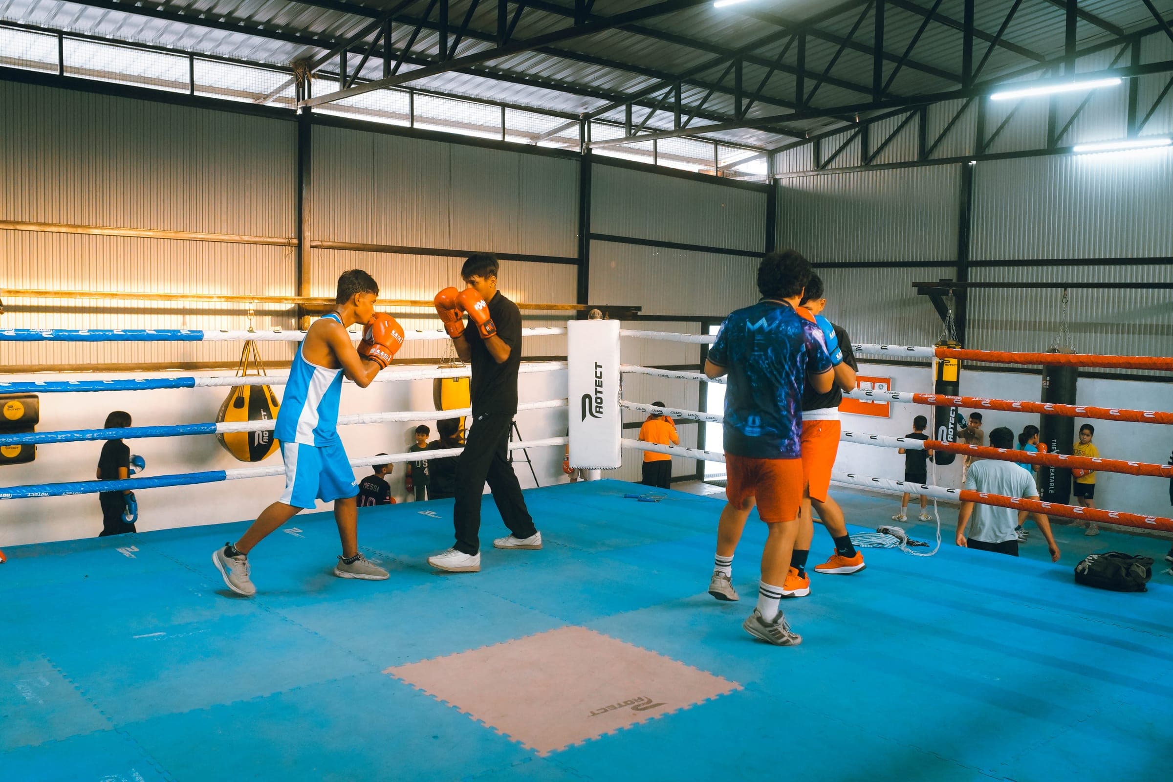Athletes training with energy at Aspire Sports Academy